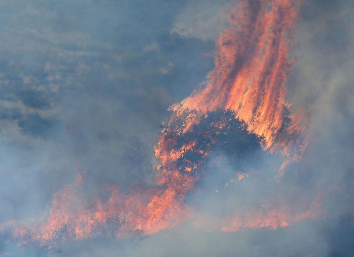 Forward progress stopped on 110acre Windmill fire burning near