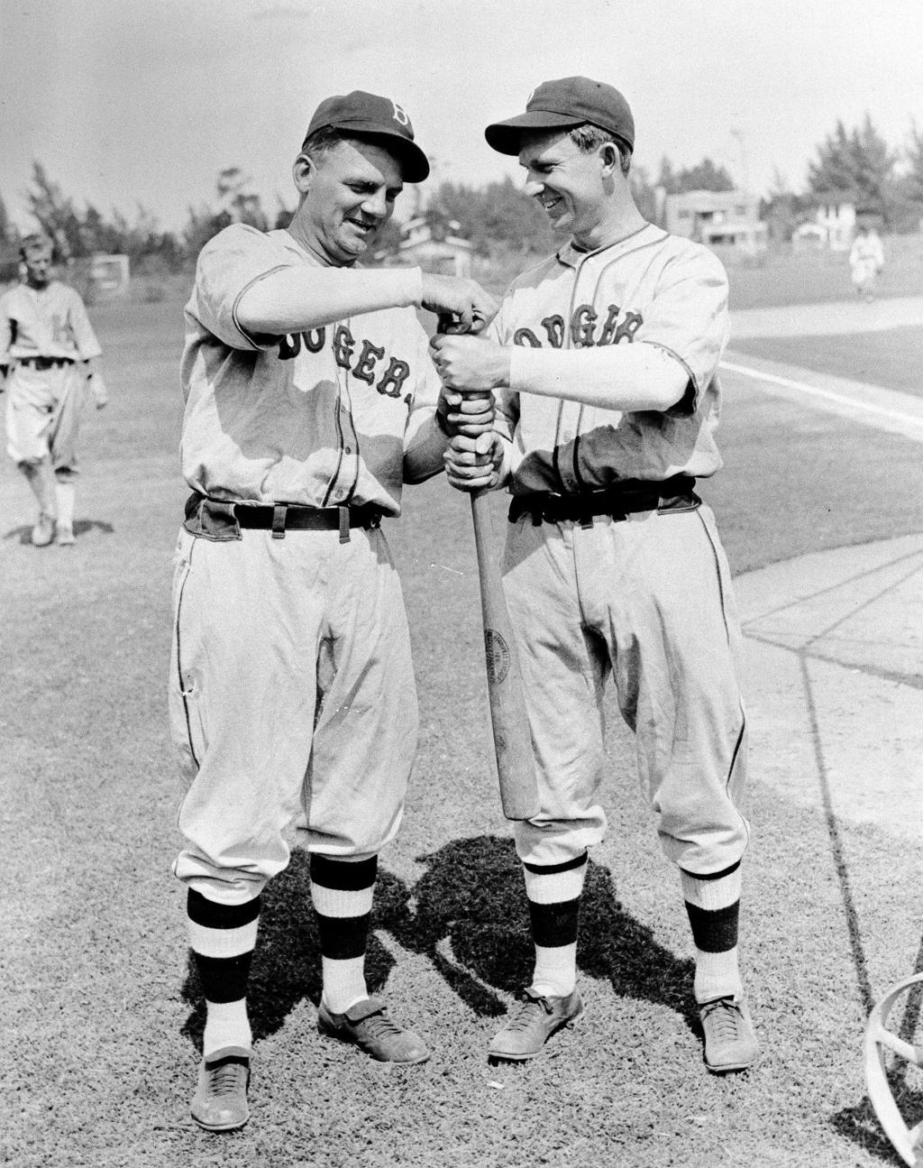 San Diego Padres' Vinny Castilla, right, smiles as he is