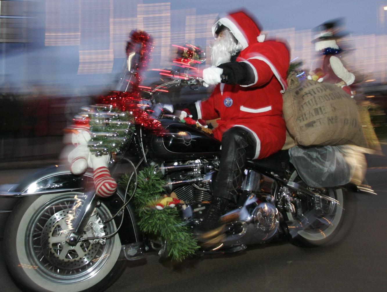 Photos Santa swaps sleigh for motorcycle National News