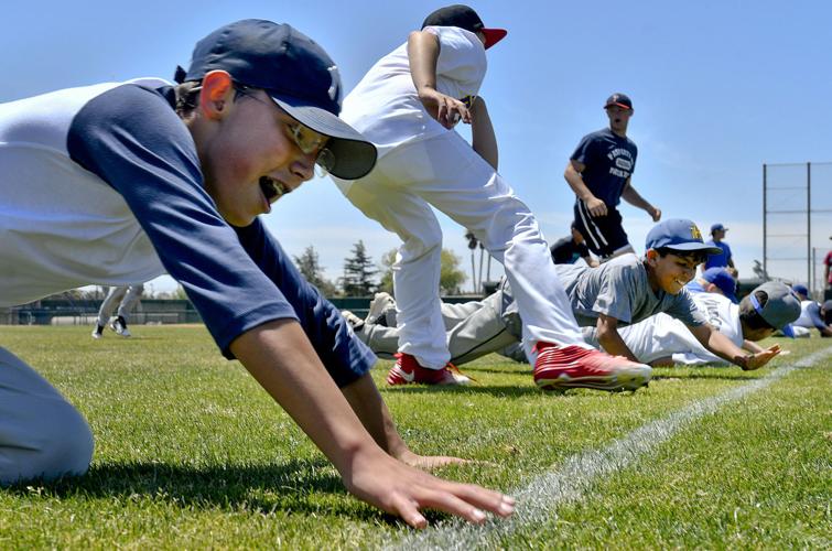 Youth Baseball: Hancock's annual baseball camp underway