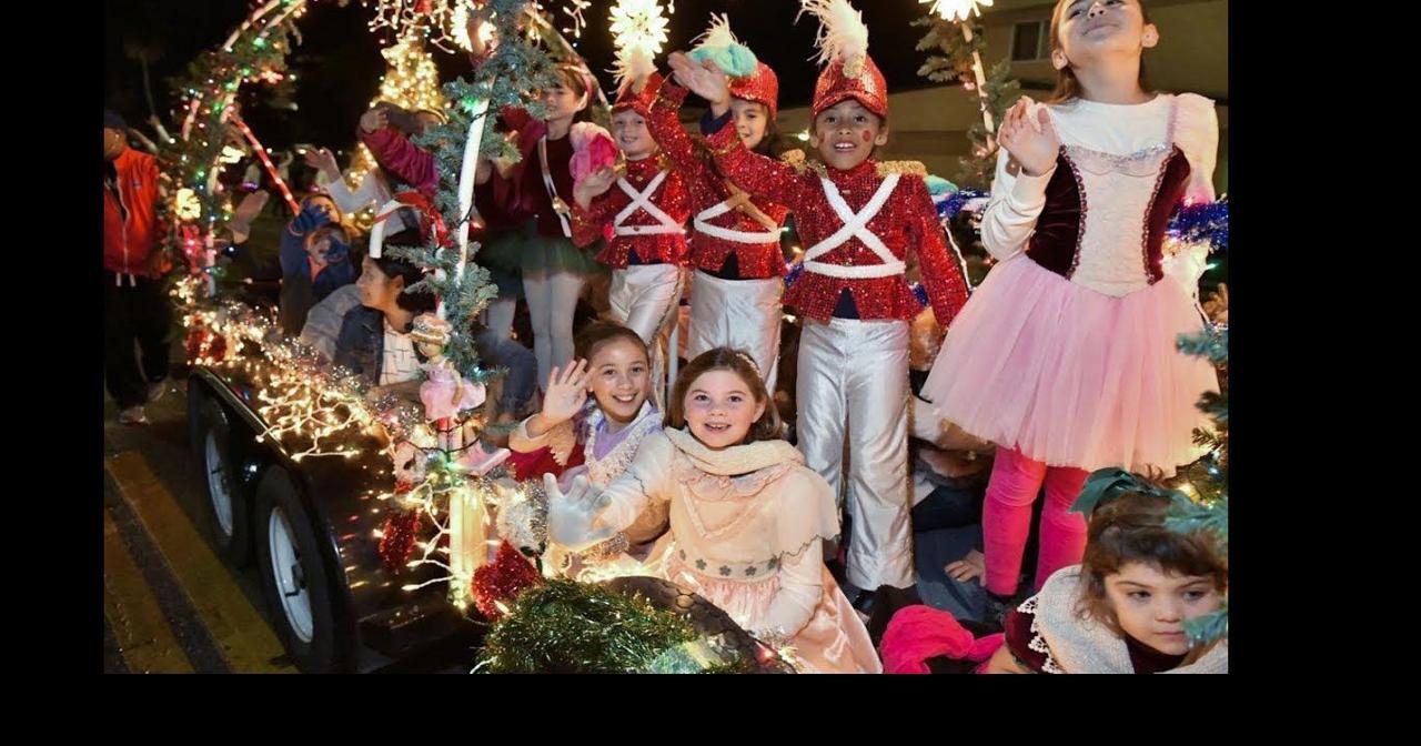 Video A little rain, wind cannot stop the Santa Maria Christmas Parade