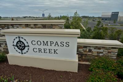 compass creek sign