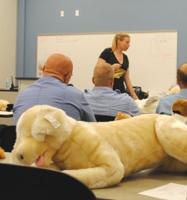 Firefighters learn CPR for pets