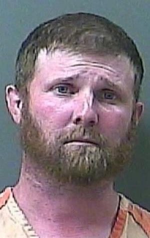 Man arrested after tractor crashes