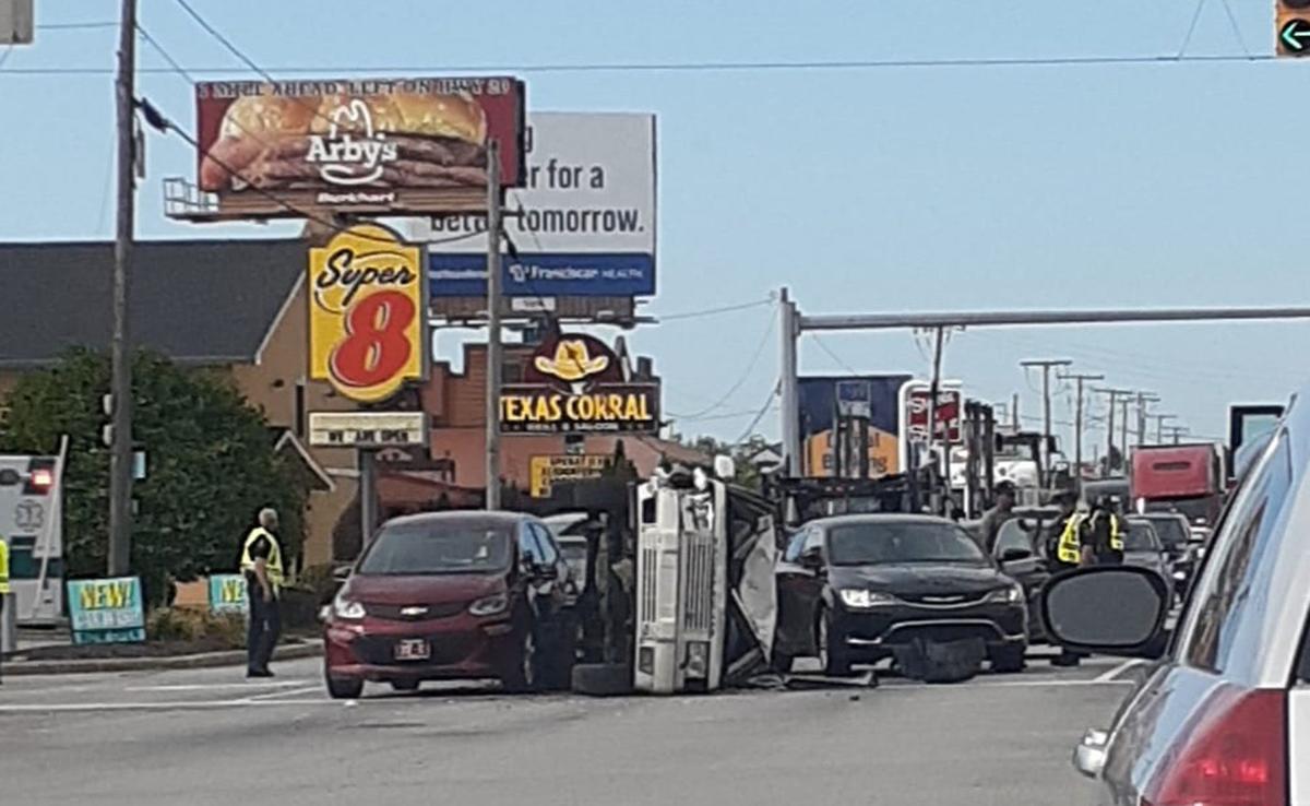 Man arrested after hitandrun crash damages 4 vehicles, injures three