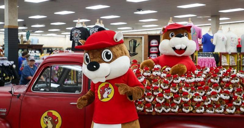 Buc-ee the Beaver dances near a display of stuffed toys during the grand opening of Buc-ee's in Brunswick on Tuesday, July 1, 2025.