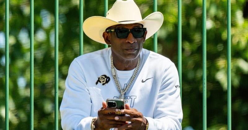 Deion Sanders takes in the second day of Cleveland Browns training camp, July 30, 2026, in Berea, Ohio.
