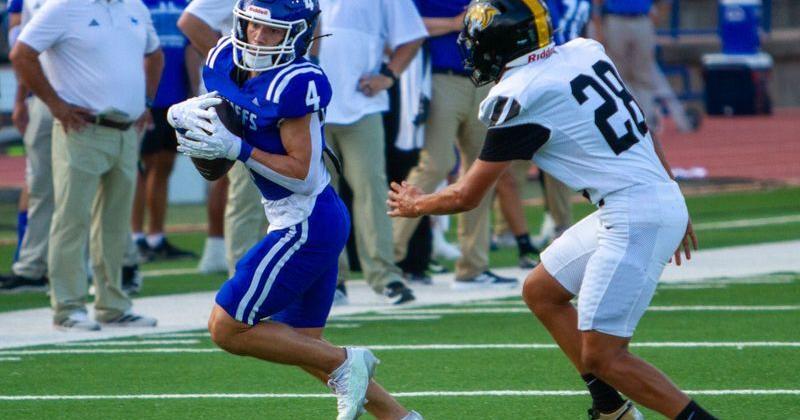 San Angelo Lake View football's Calvin Whitfield (4) runs with the ball after a reception against Snyder in a game at San Angelo Stadium on Friday, Sept. 4, 2026.