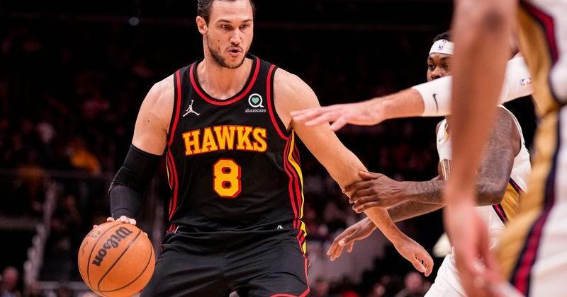 Mar 20, 2022; Atlanta, Georgia, USA; Atlanta Hawks forward Danilo Gallinari (8) controls the ball against the New Orleans Pelicans during the first half at State Farm Arena. Mandatory Credit: Dale Zanine-USA TODAY Sports