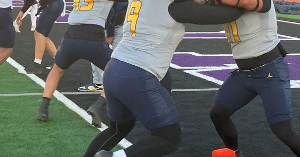 Eastwood warms up before their game at Franklin on Friday, Oct. 16.