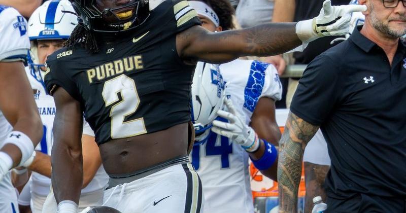 Purdue's Fame Ijeboi signals for a first down on Friday, Sept. 4, 2026, during the NCAA football game between the Purdue