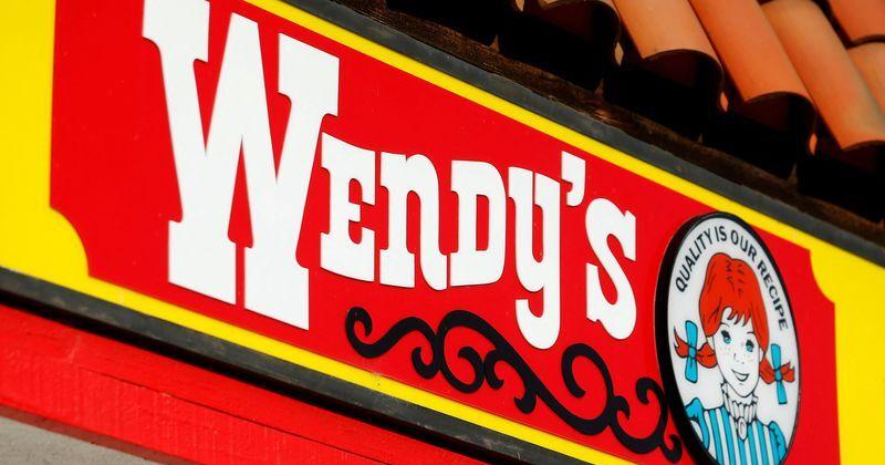 FILE PHOTO: A Wendy's sign and logo are shown at one of the company's restaurant in Encinitas, California