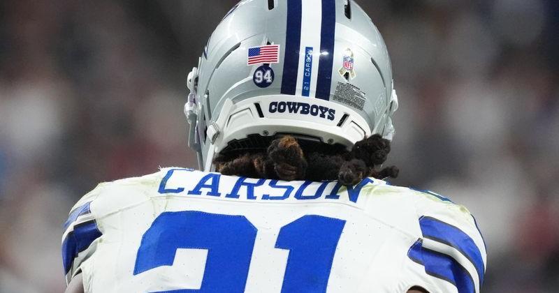 Nov 17, 2025; Paradise, Nevada, USA; Dallas Cowboys cornerback Caelen Carson (21) wears a “94” decal on his helmet to honor teammate Marshawn Kneeland who tragically passed on November 6th, during the first half against the Las Vegas Raiders at Allegiant Stadium. Mandatory Credit: Kirby Lee-Imagn Images
