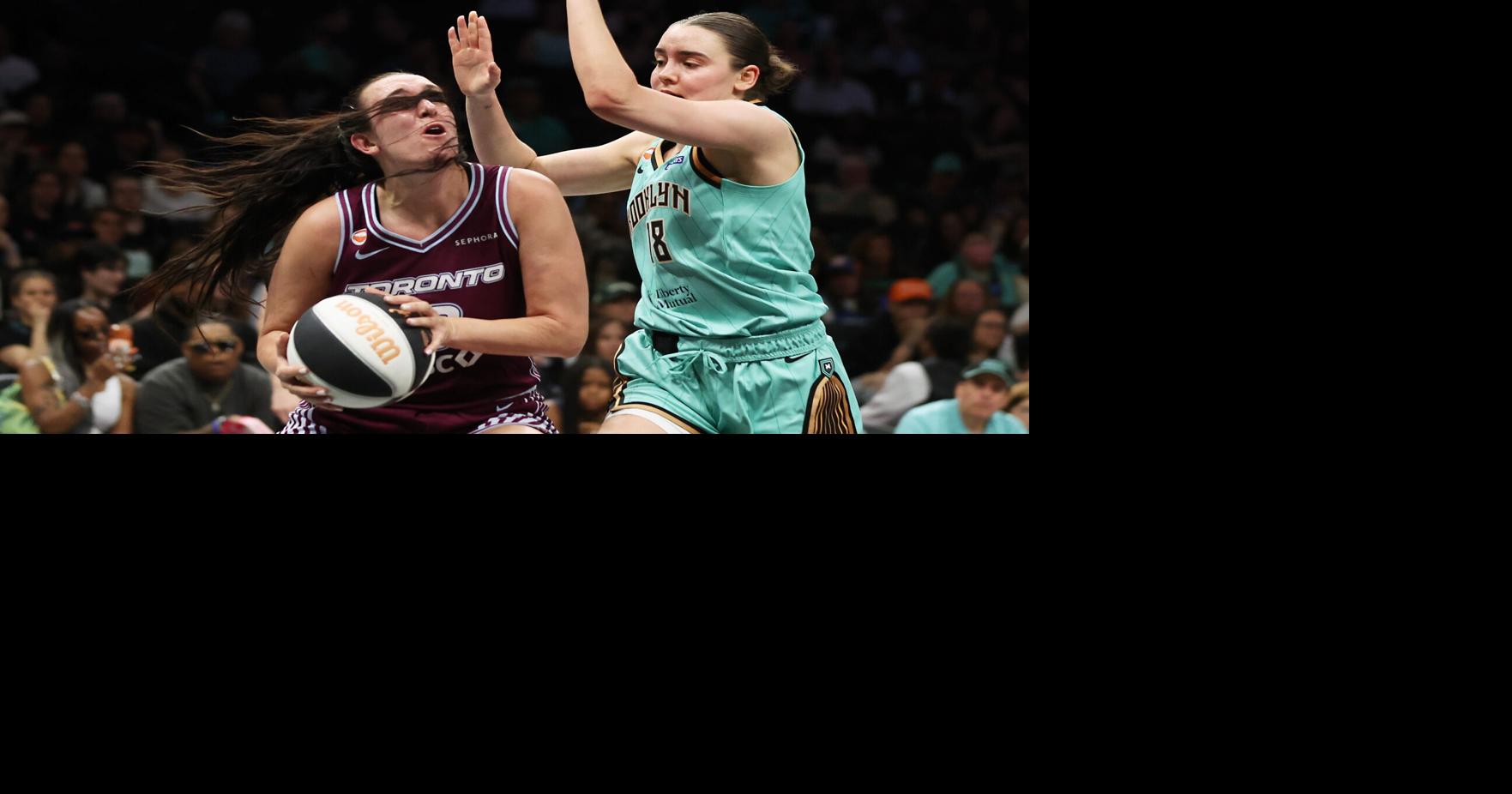 APTOPIX Tempo Liberty Basketball