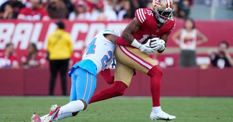August 13, 2026; Santa Clara, California, USA; San Francisco 49ers wide receiver De'zhaun Stribling (15) is tackled by Tennessee Titans cornerback Alontae Taylor (24) during the first quarter at Levi's Stadium. Mandatory Credit: Kyle Terada-Imagn Images