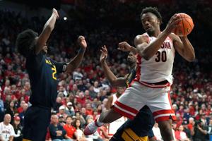 Burries scores 22 points, No. 1 Arizona dominates West Virginia 88-53 to remain undefeated
