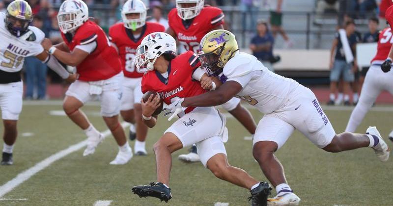 Miller's Deion Jones tackles Veterans Memorial quarterback Aaron Hinojosa during Friday's non-district game at Buc Stadium on Sept. 4, 2026, in Corpus Christi, Texas.
