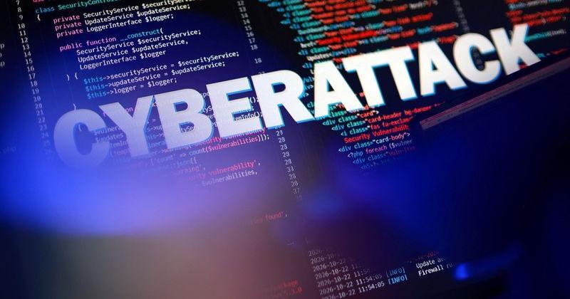 Illustration shows "Cyberattack" text and PHP code