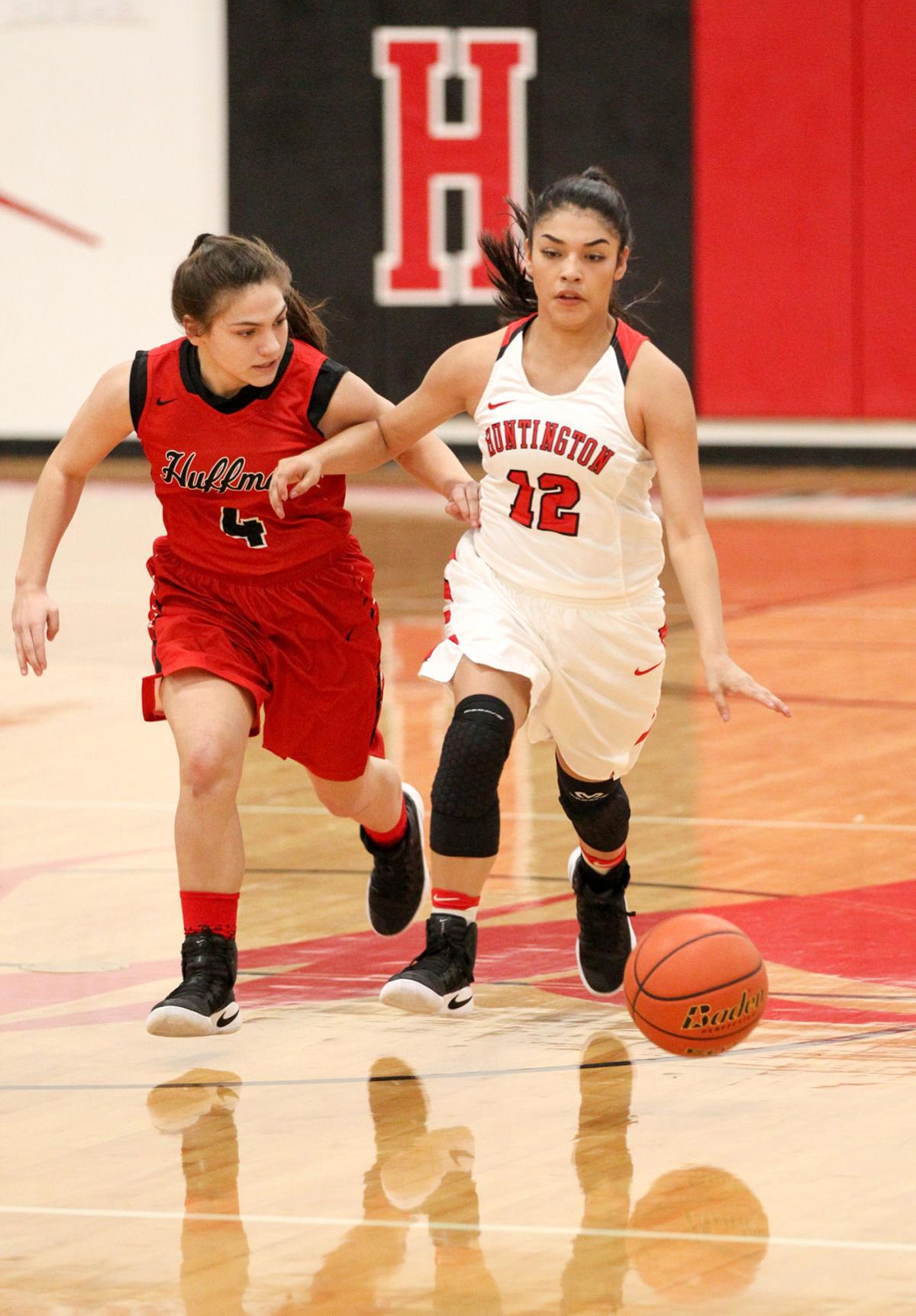 Huntington teams split with Huffman Hargrave Sports