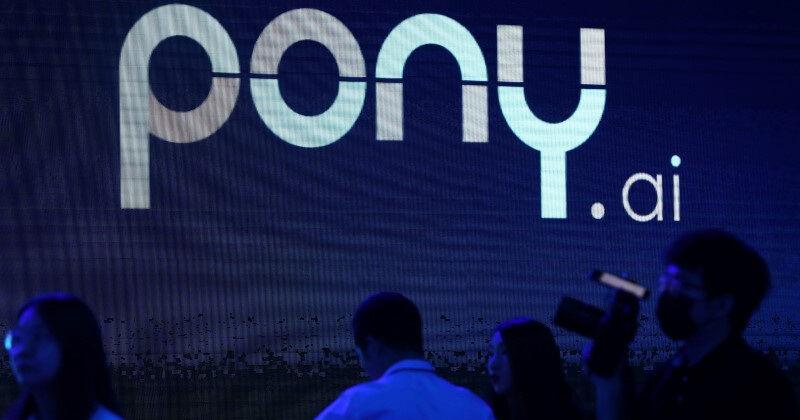 Logo of the autonomous driving technology startup Pony.ai is seen on a screen, in Beijing
