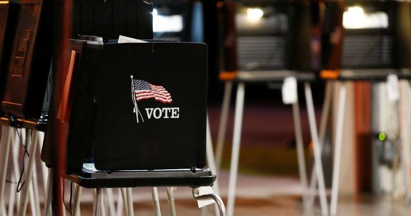 A voting booth is seen at a polling center inside a fire station in the Coral Gables neighbourhood during the Democratic presidential primary election in Miami