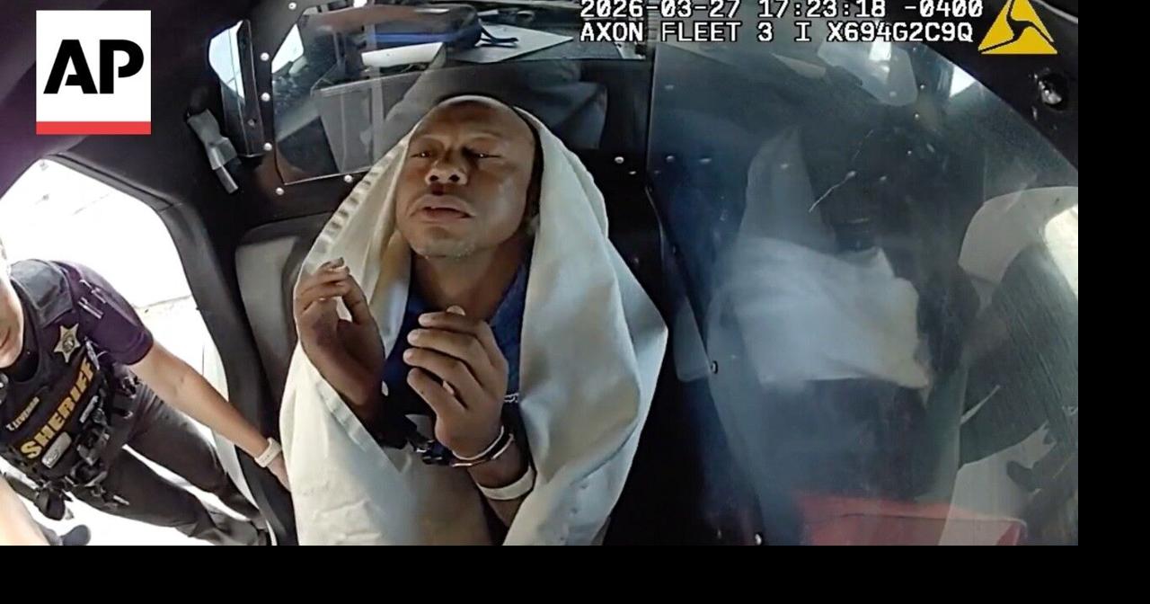 Bodycam video shows Tiger Woods appearing to nod off in back of police ...