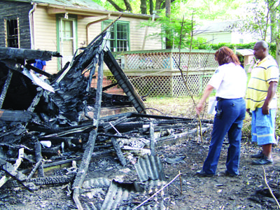 Discarded cigarette could be cause of fire that destroyed carport