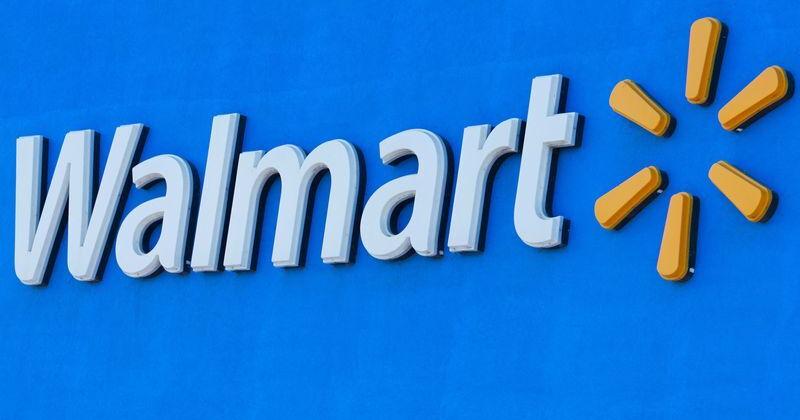 Walmart logo is shown on a super store in California