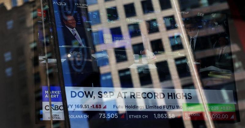 Screen displays trading information outside the Nasdaq Market site in New York City