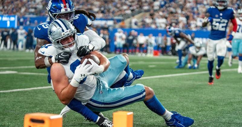 New York Giants linebacker Tremaine Edmunds (49) stops Dallas Cowboys tight end Jake Ferguson (87) at the goal line during a week one opening game between the New York Giants and Dallas Cowboys at Metlife Stadium on Sunday, Sept. 13, 2026, in East Rutherford, NJ.