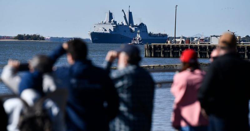 Onlookers gather in the Navy Yard in Philadelphia and view the Parade of Ships, that celebrates the 250th anniversary of the founding of the U.S. Navy and Marine Corps, on Thursday, October 9, 2025.
