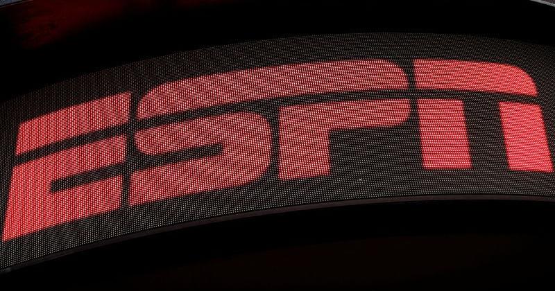 The ESPN logo is seen on an electronic display in Times Square in New York City
