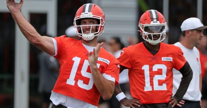 Joe Flacco throws as Shedeur Sanders looks on during Browns training camp July 25, 2025, in Berea, Ohio.
