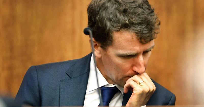 Patrick Clancy reacts as images of himself and his children on vacation a month before they were killed are shown in the Plymouth Superior Court in Plymouth, Massachusetts, on Monday, July 27, 2026.