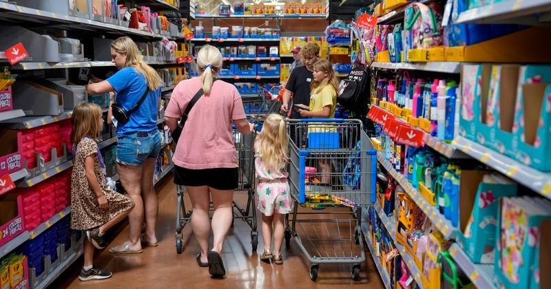 People shop for school supplies inside a Walmart in Edmond, Okla., Tuesday, July...
