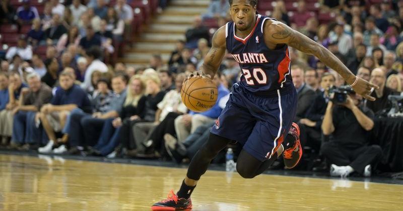 Nov 5, 2013; Sacramento, CA, USA; Atlanta Hawks small forward Cartier Martin (20) drives in against the Sacramento Kings during the first quarter at Sleep Train Arena. Mandatory Credit: Kelley L Cox-USA TODAY Sports