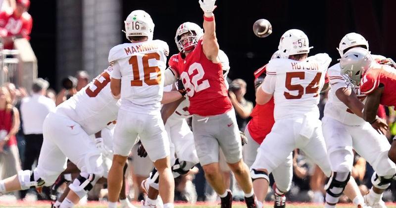 Ohio State Buckeyes defensive end Caden Curry (92) pressures Texas Longhorns quarterback Arch Manning (16) during the second