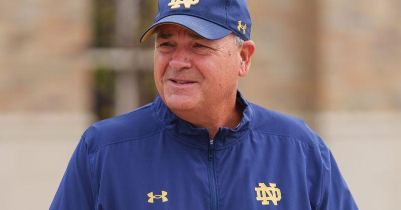 Offensive coordinator Mike Denbrock walks to a Notre Dame football practice at Irish Athletic Center on Thursday, Aug. 6, 2026, in South Bend.