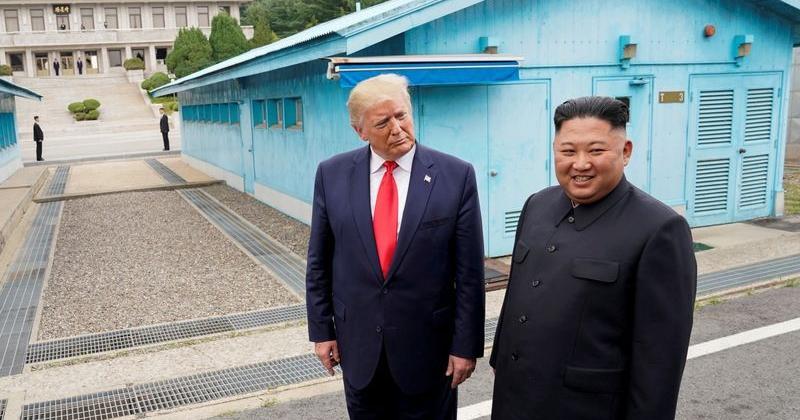 FILE PHOTO: Trump meets with North Korean leader Kim Jong Un at the DMZ on the border of North and South Korea