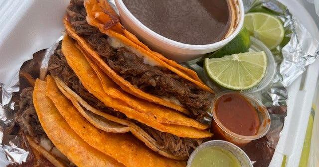 Birria tacos at Casa de la Birria, a food truck in Columbus' Franklinton neighborhood are loaded with stewed beef and melted cheese, and they come with a cup of richly seasoned broth.