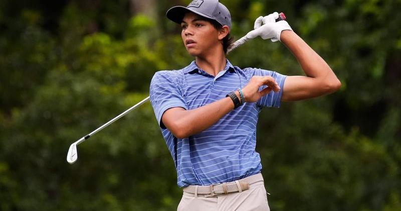 Charlie Woods tees off of 8 during the second round of the Junior Players Championship, at the Stadium Course at TPC Sawgrass,