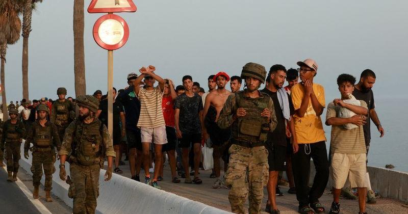 Mass crossings of migrants on foot and by sea from Morocco into Spanish territory, in Ceuta