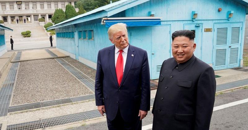 FILE PHOTO: Trump meets with North Korean leader Kim Jong Un at the DMZ on the border of North and South Korea