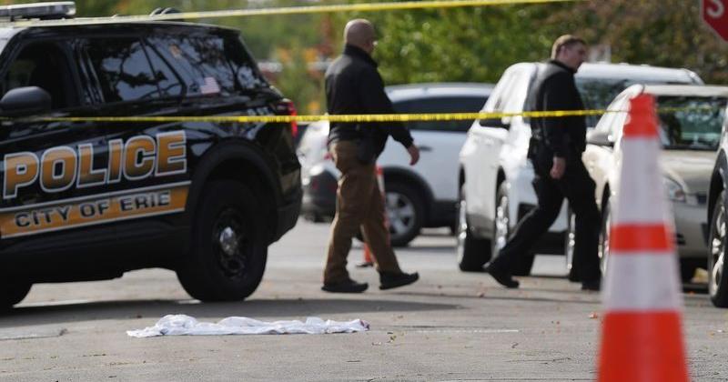 Erie Bureau of Police investigate the scene where multiple people were killed in a reported shooting in and around a home at 722 Perry St. in Erie, Pa., Oct. 9, 2026.
