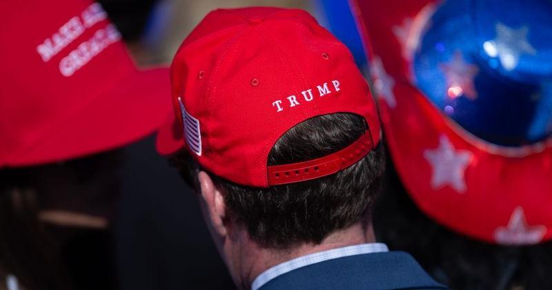 Attendees at President Donald Trump's stop at the Port of Corpus Christi wear Trump memorabilia in Corpus Christi, Texas, on Feb. 27, 2026.