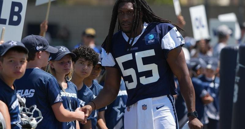Aug 1, 2026; Oxnard, CA, USA; Dallas Cowboys linebacker Jaishawn Barham (55) greets fans at training camp at River Ridge Playing Fields. Mandatory Credit: Kirby Lee-Imagn Images