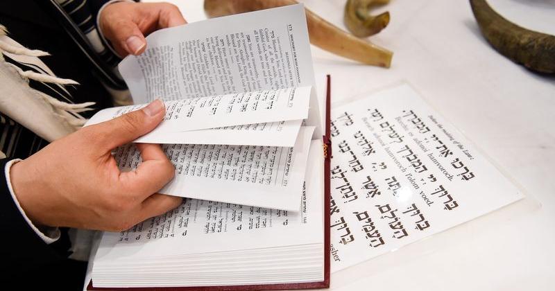 A rabbi reads through passages as he prepares to celebrate Rosh Hashanah at the Chabad Center in Nashville, Tennessee.