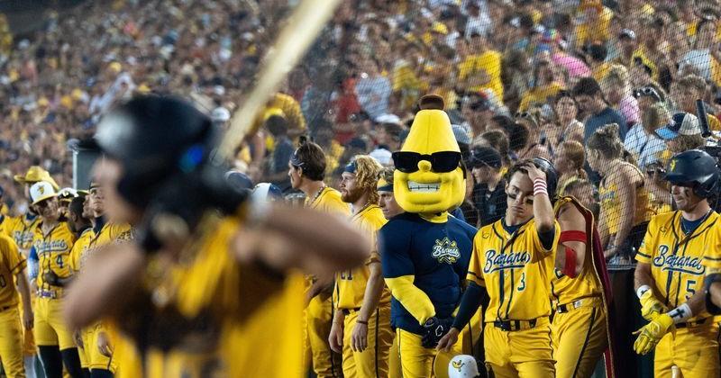 The Savannah Bananas cheer on their teammate during a game against the Firefighters on July 3, 2026, at Kinnick Stadium in Iowa City, Iowa.