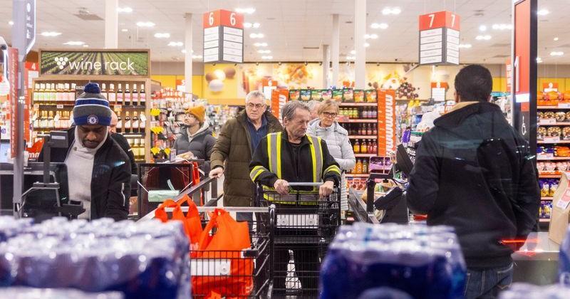 People shop in a grocery store in Mississauga