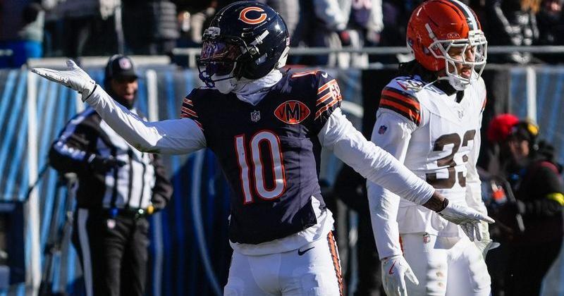 Dec 14, 2025; Chicago, Illinois, USA; Chicago Bears wide receiver Luther Burden III (10) celebrates after a first down during the first quarter against the Cleveland Browns at Soldier Field. Mandatory Credit: David Banks-Imagn Images